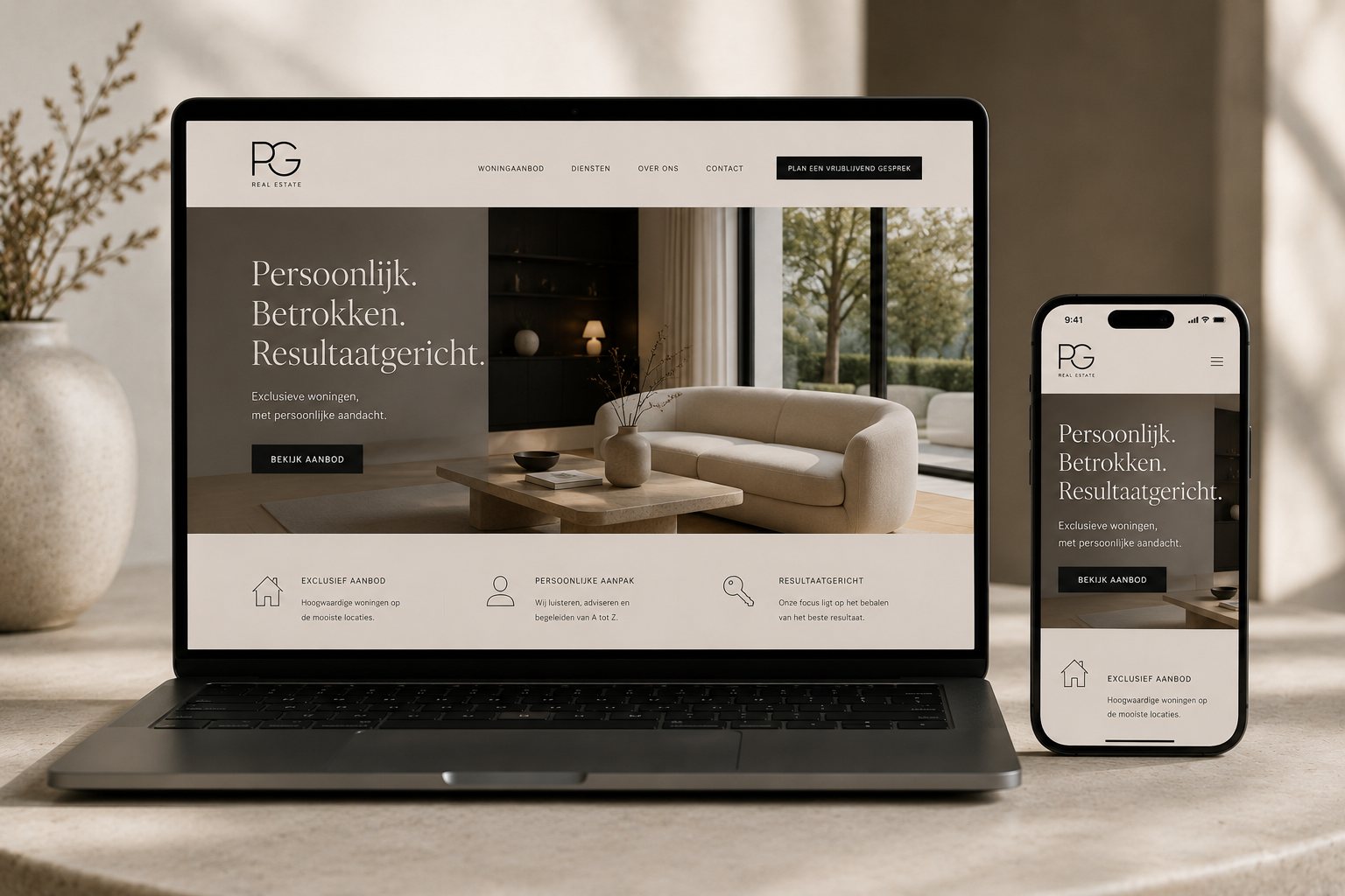 PG Real Estate website on laptop